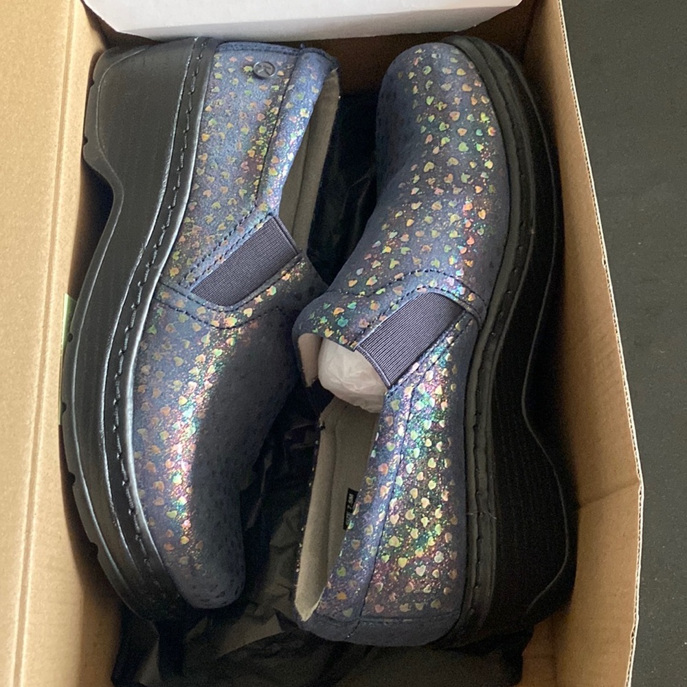 Dark blue clogs with colorful hearts. Worn only once!!